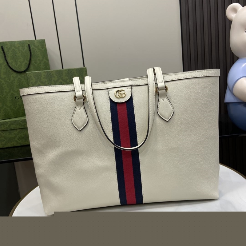 G*u*i shopping bags